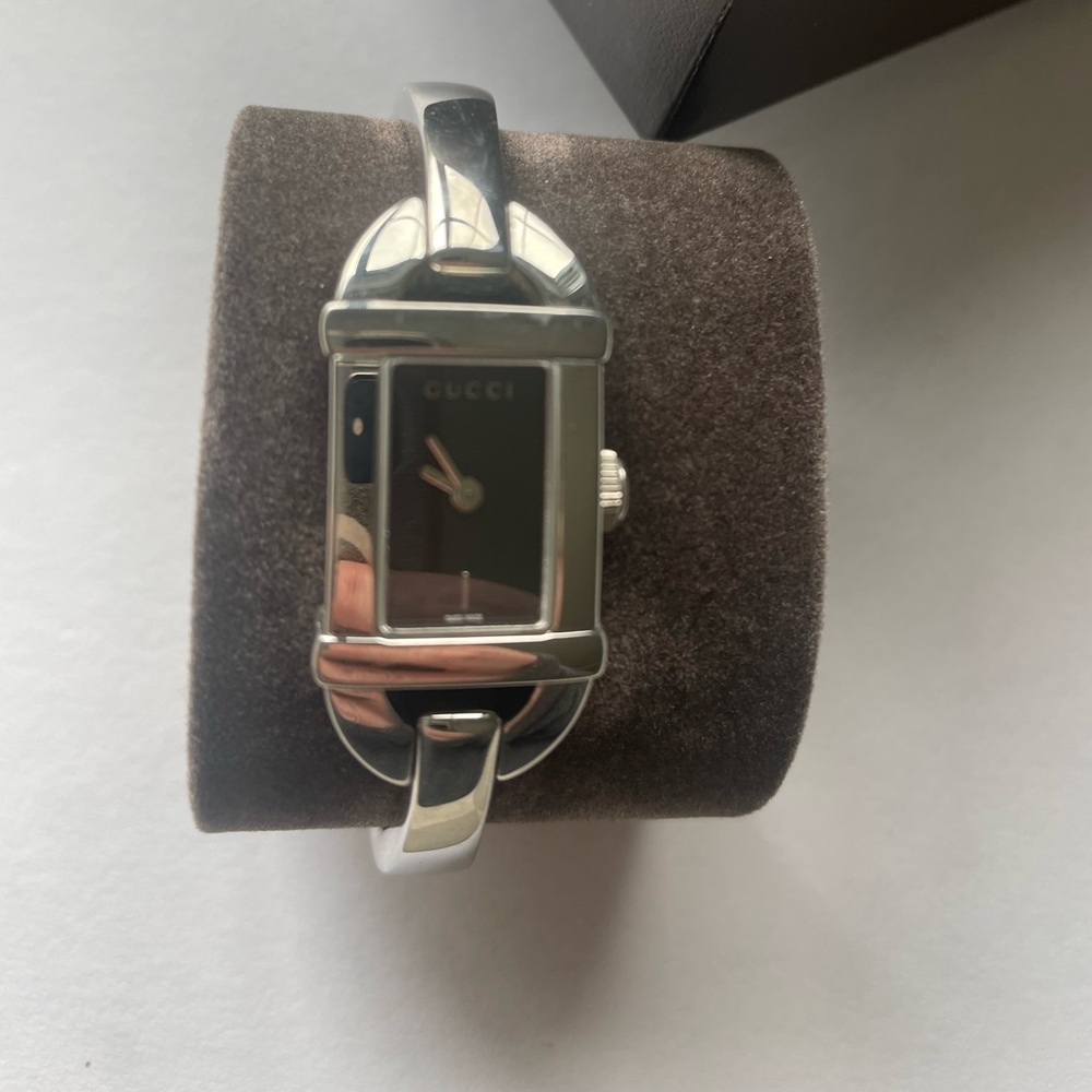 Authentic Gucci bracelet watch 6800L 
New in box